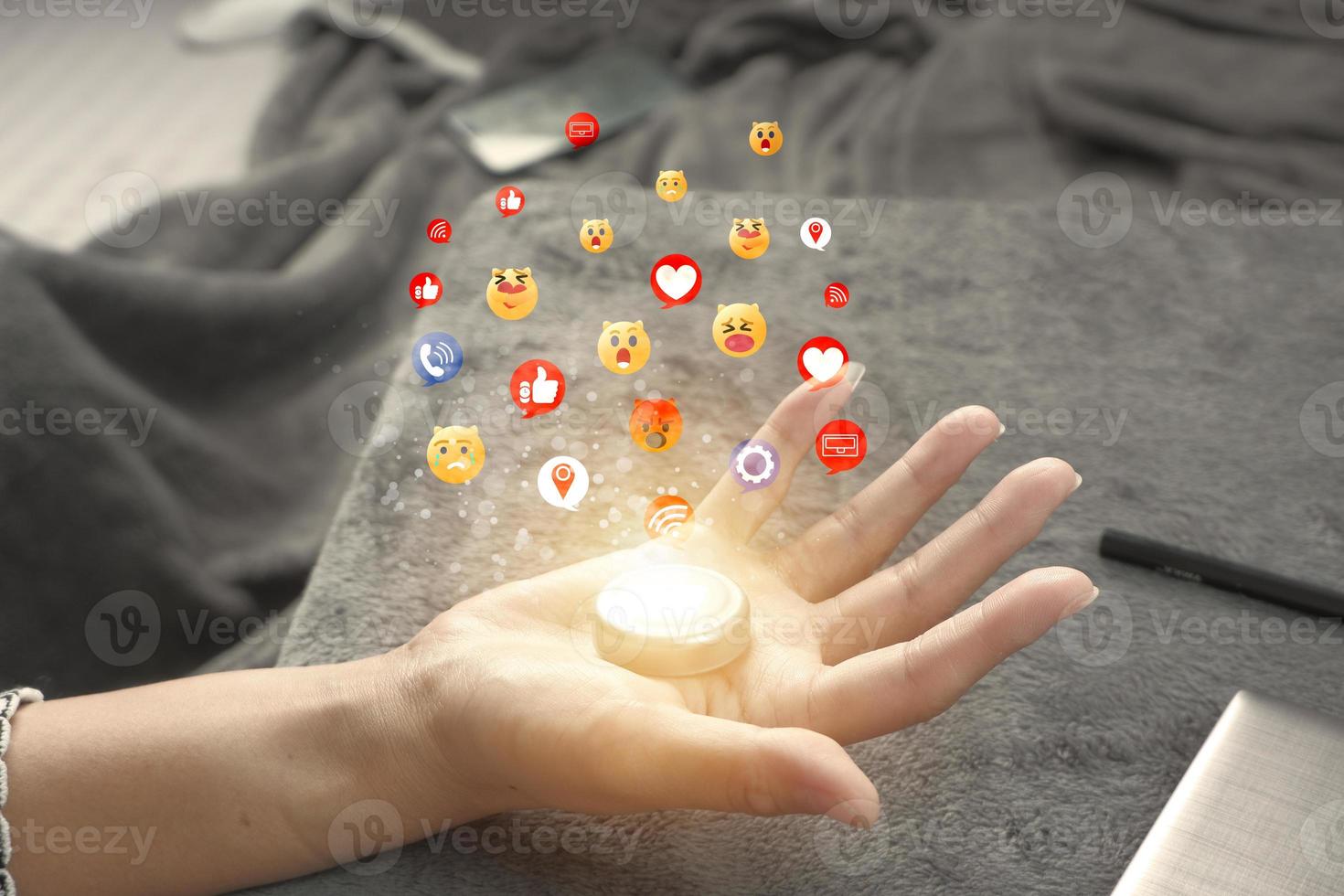 Social media and online digital concepts Coming out as a hologram icon Concept holiday living and social media social distancing. photo