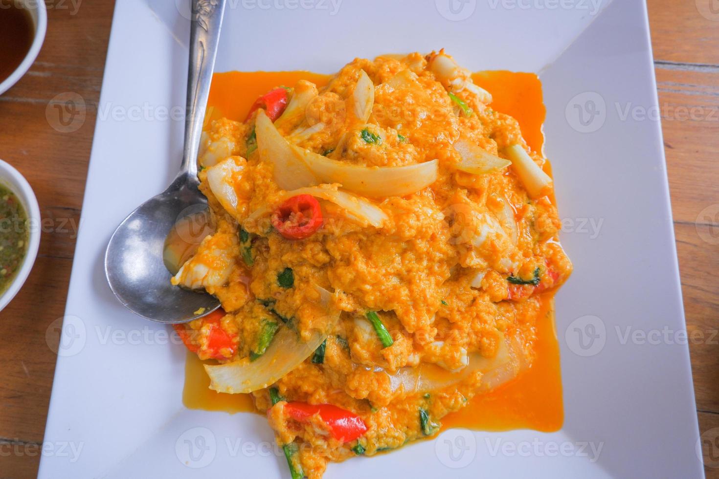 Stir-fried crab meat with curry powder, Thai food. photo