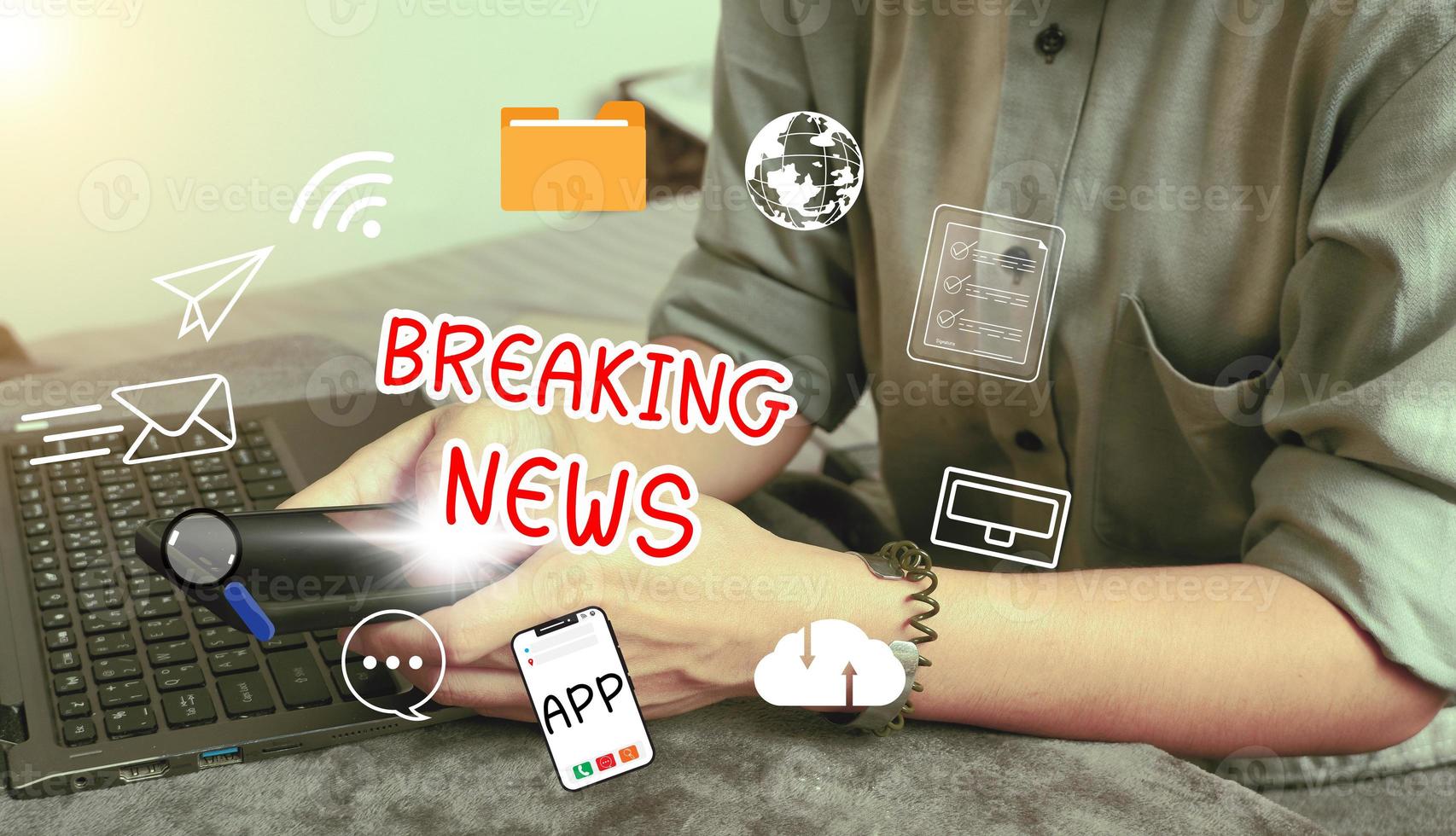 Online breaking news concept. hand holding smartphone using to watch around the globe news and daily updates on web page screens. photo