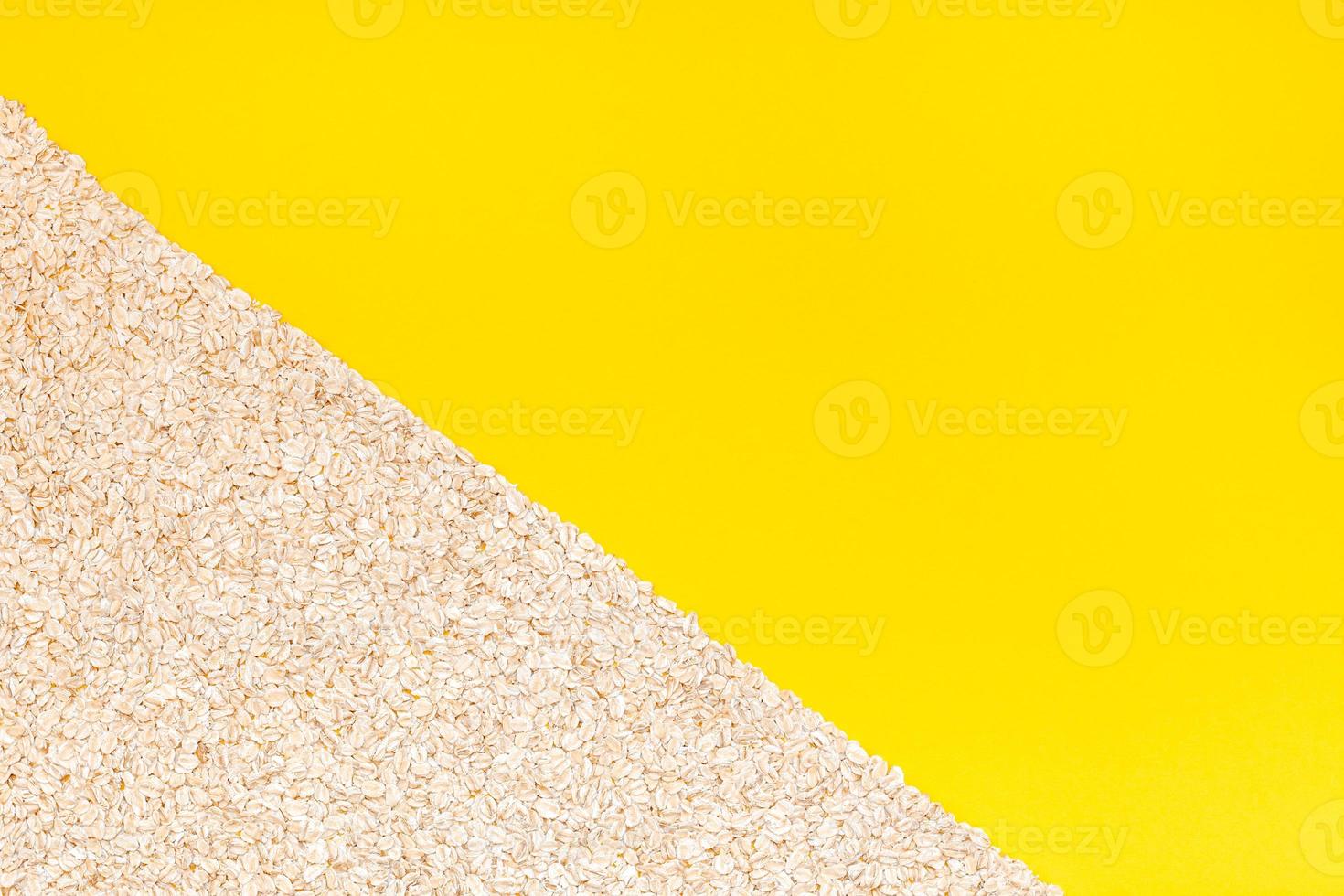 Top view of oatmeal flakes in minimal style photo