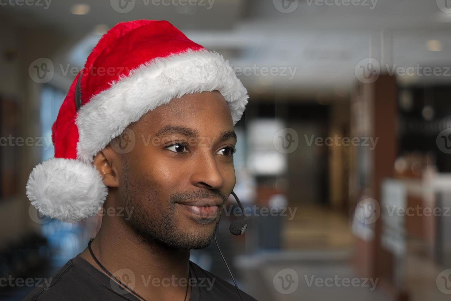 christmas support center customer service helpline red santa claus hat office receptionist headset photo