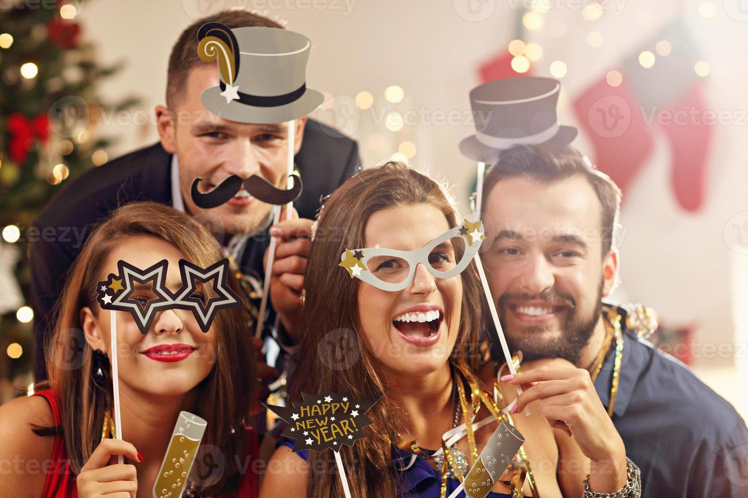 Group of friends celebrating New Year photo