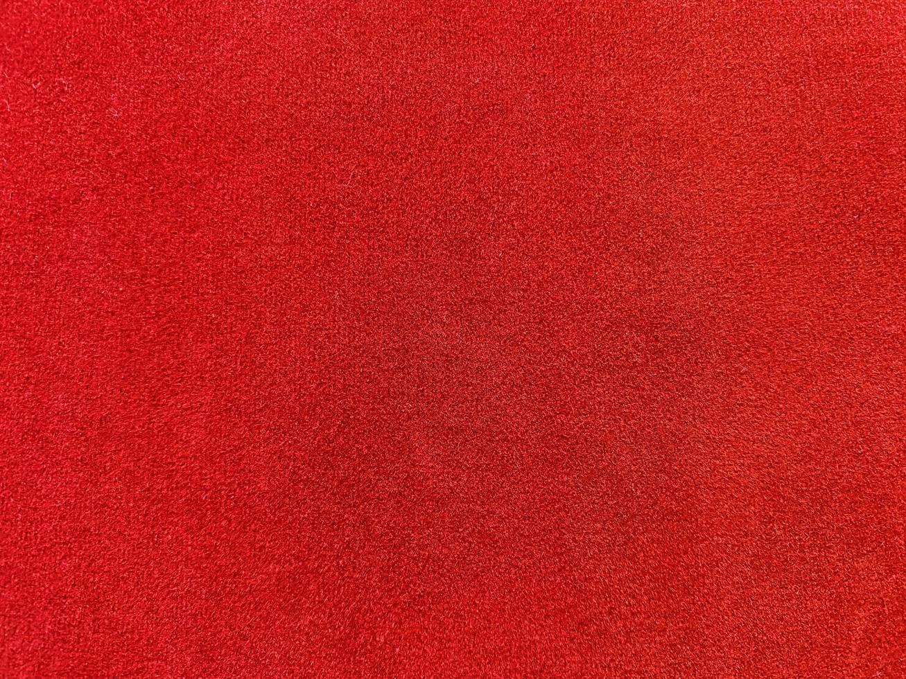 Red velvet fabric texture used as background. Empty red fabric background of soft and smooth textile material. There is space for text. photo