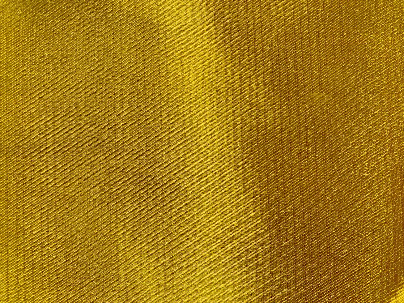 textura de tela de tela dorada utilizada como fondo. fondo de tela de tela  dorada vacía de material textil suave y liso. hay espacio para el texto  15937148 Foto de stock en