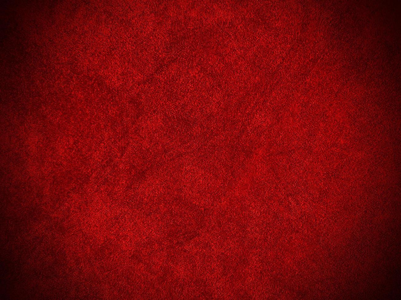 Dark red velvet fabric texture used as background. Empty dark red fabric background of soft and smooth textile material. There is space for text.. photo