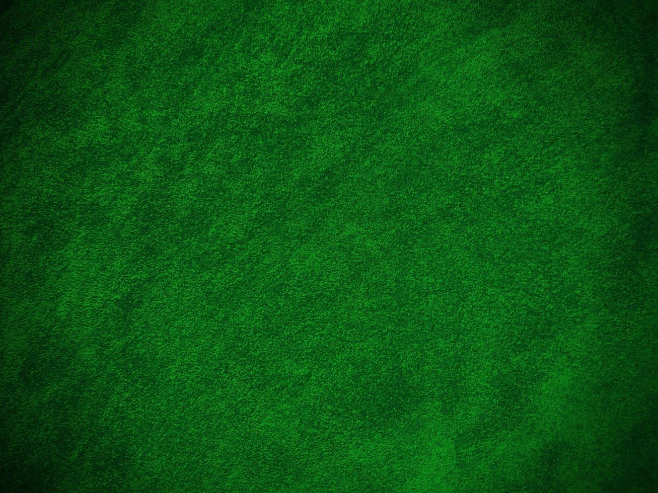 Dark green old velvet fabric texture used as background. Empty green fabric background of soft and smooth textile material. There is space for text... photo