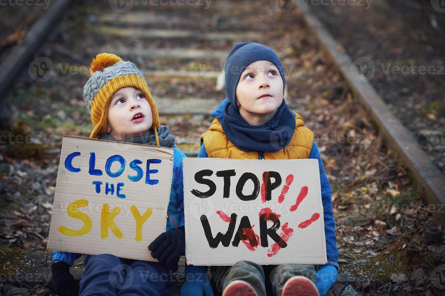 Picture of a child with a lot of love and peaceful message close sky photo