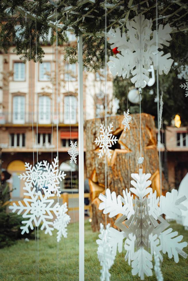 STRASBOURG, FRANCE - December 2022 - new Christmas decorations in place Kleber in front of the tree photo