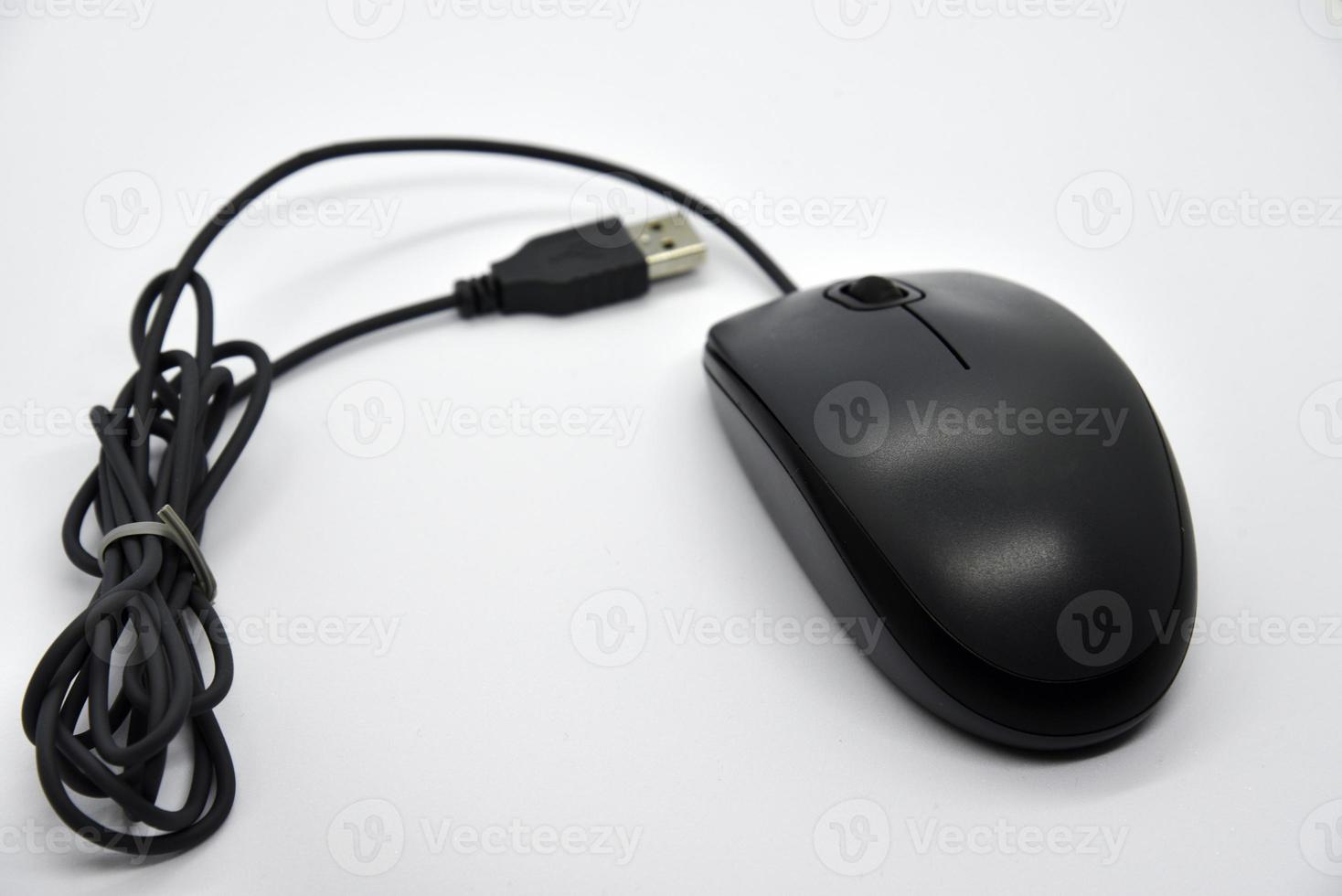 A gray computer mouse on a white background. Beautiful shiny computer mouse close-up. Mouse manipulator. A computer gadget. photo