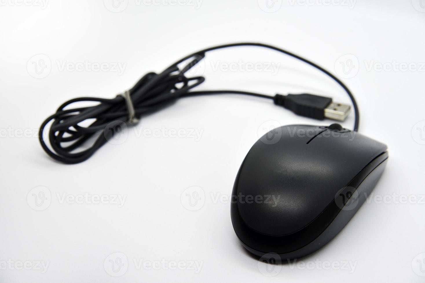 A gray computer mouse on a white background. Beautiful shiny computer mouse close-up. Mouse manipulator. A computer gadget. photo