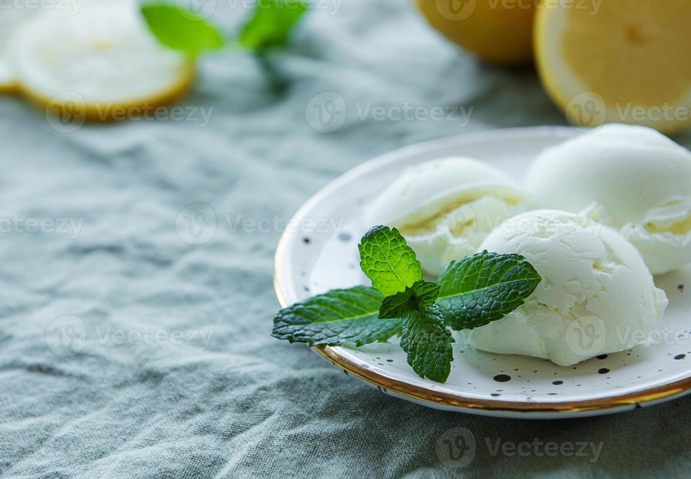 Homemade citrus lemon ice cream with mint photo