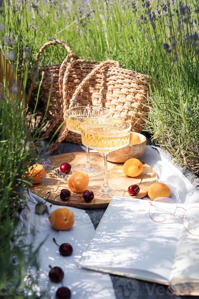 Summer picnic on a lavender field photo