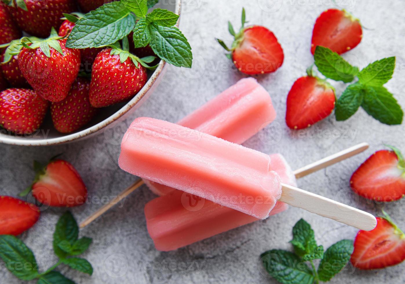 Strawberry ice cream popsicles photo