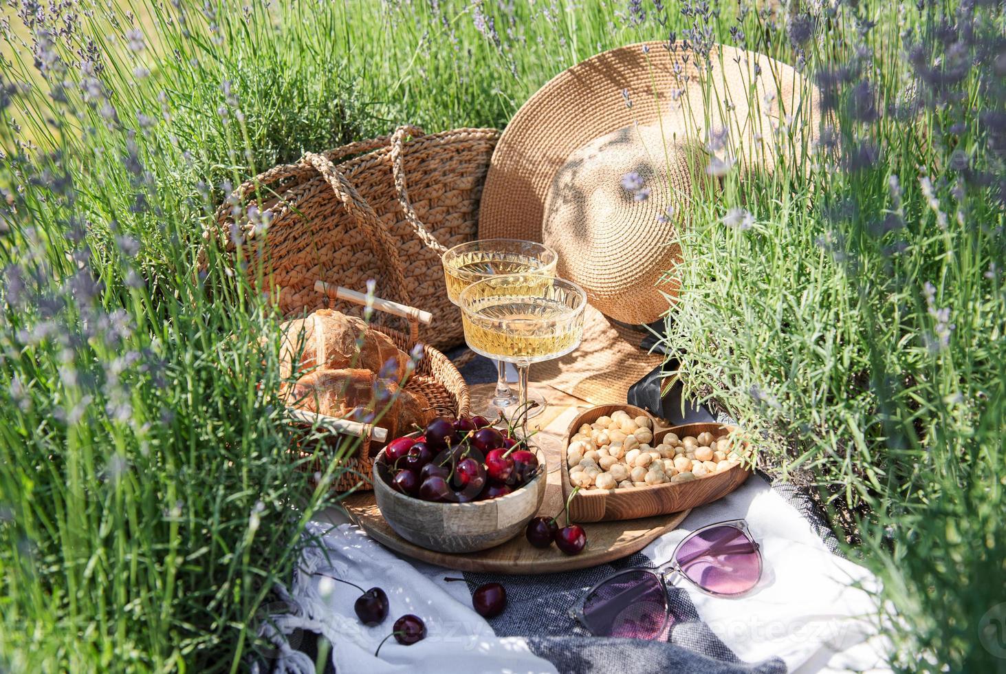 Summer picnic on a lavender field photo