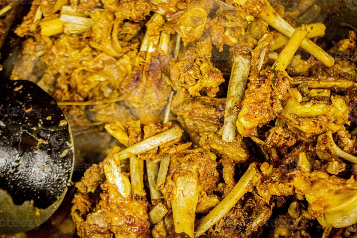 tengkleng kambing or goat tengkleng is a kind of soup with the main ingredient of goat bones. tengkleng like curry with goat bone material photo