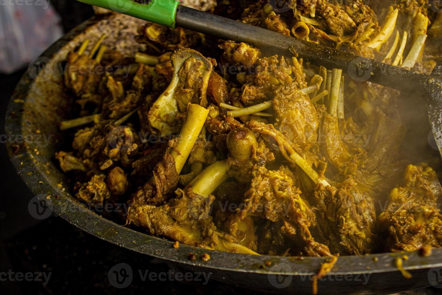 tengkleng kambing or goat tengkleng is a kind of soup with the main ingredient of goat bones. tengkleng like curry with goat bone material photo
