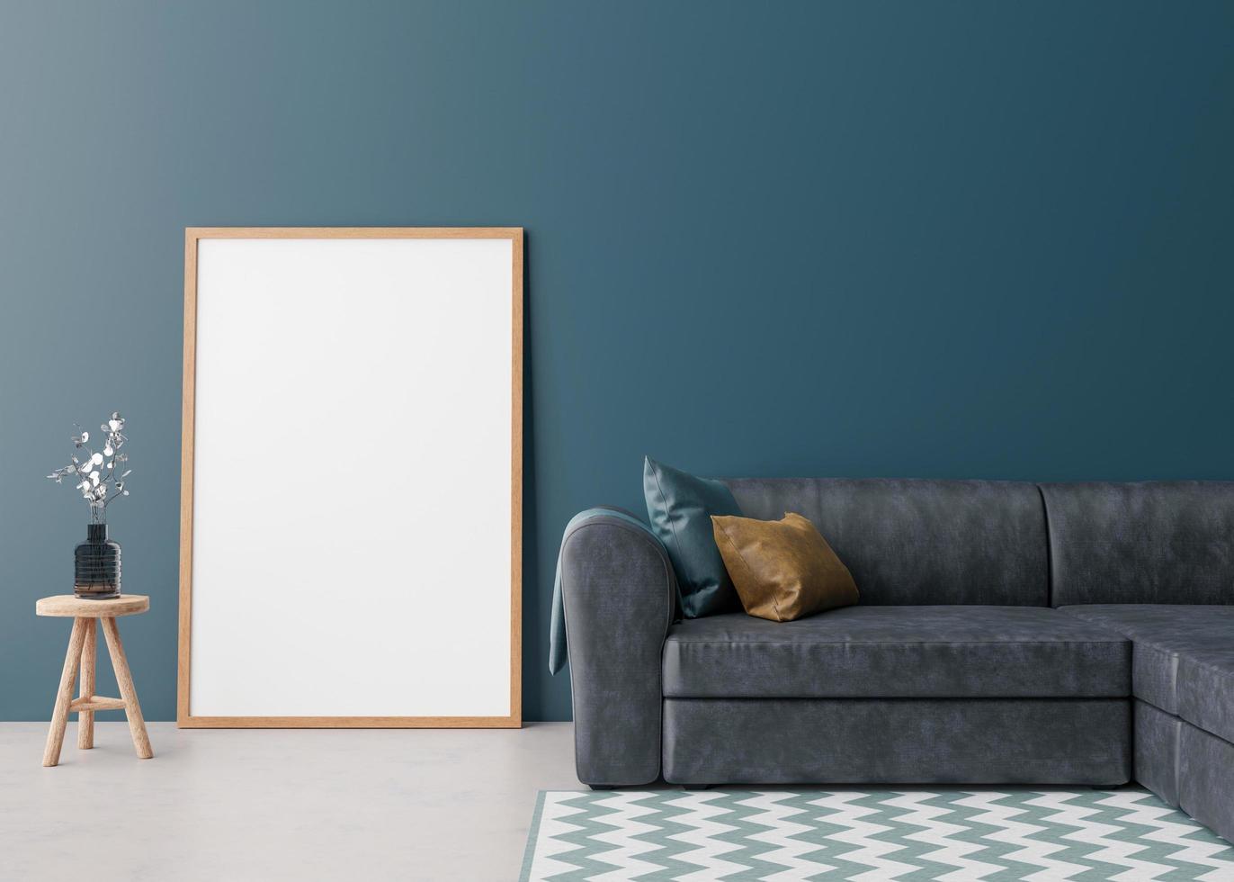 marco de imagen vertical vacío en la pared azul en la sala de estar moderna. maqueta interior en estilo escandinavo. espacio libre para la imagen. sofá azul y mesa de madera con jarrón. representación 3d foto