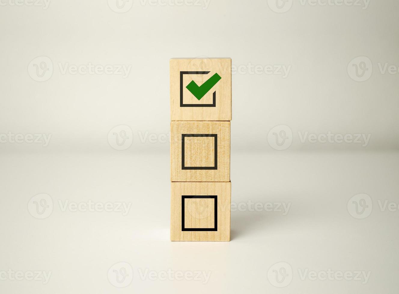 Checklist concept, wooden blocks cubes with icon photo