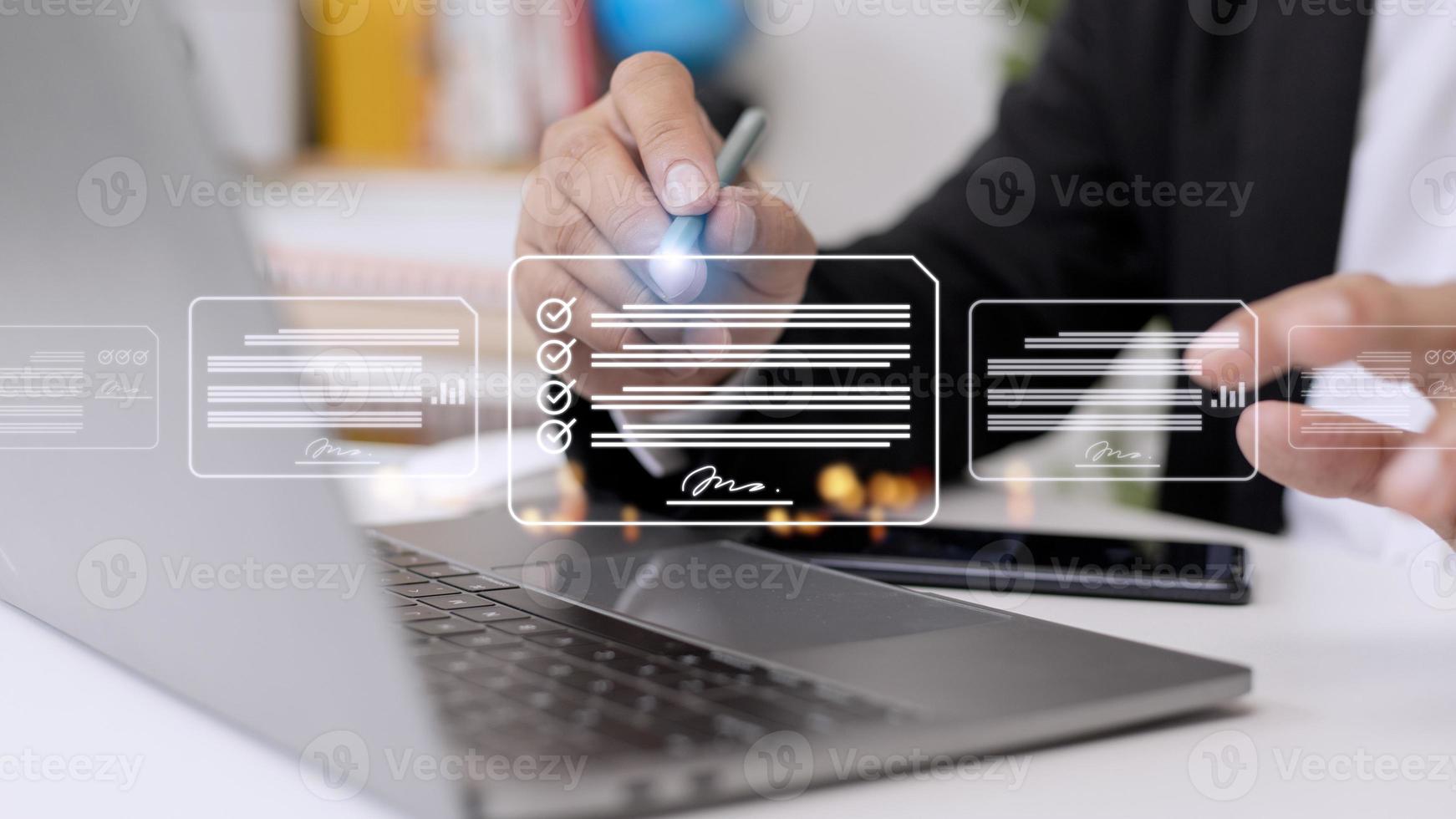 Paperless workplace ideas, e-signing, electronic signature, document management. A businessman signs an electronic document on a digital document on a virtual screen using a stylus pen. photo