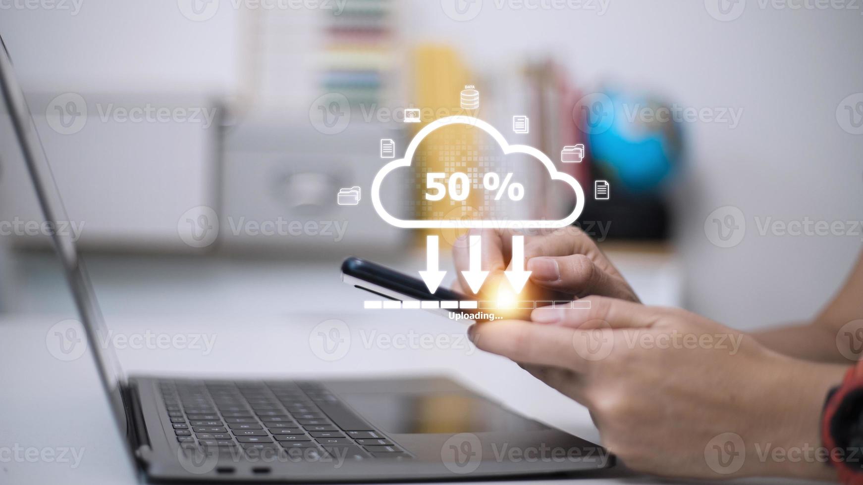 Woman doing cloud uploading on laptop in office. Data infomation photo