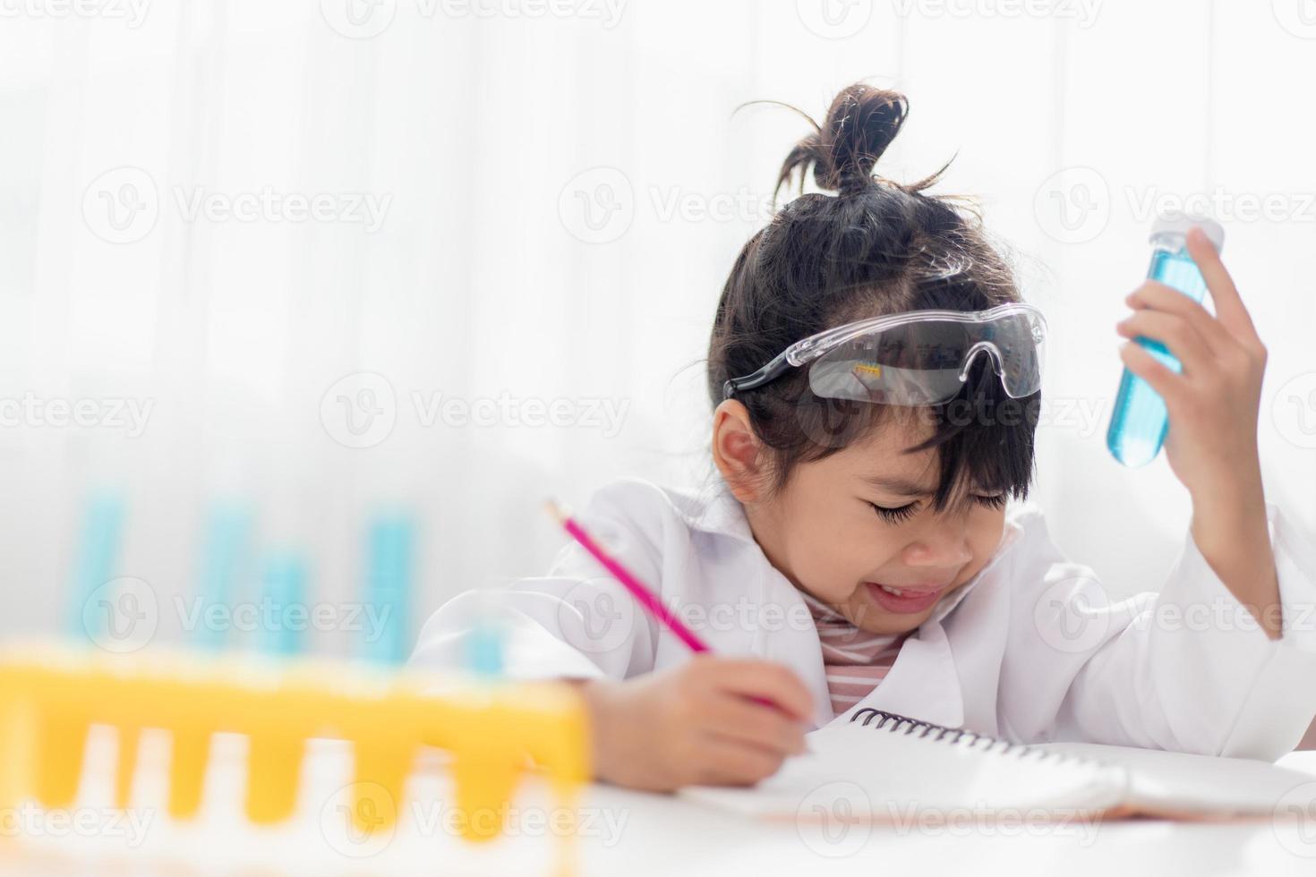 Asian child girl sick with sneezing on the nose and cold cough because weak or virus and bacteria from dust weather and kindergarten and preschool photo