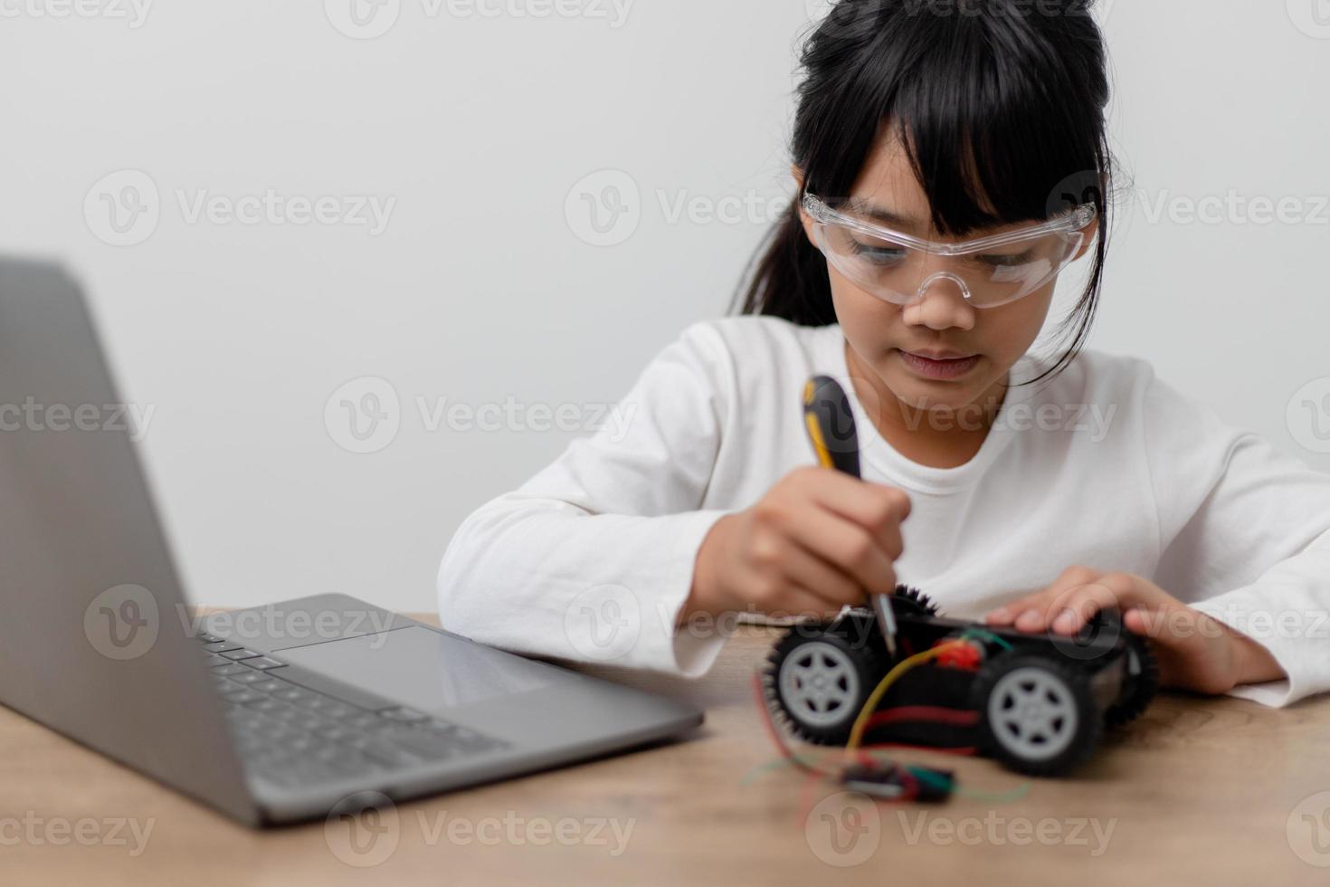 Asia students learn at home in coding robot cars and electronic board ...