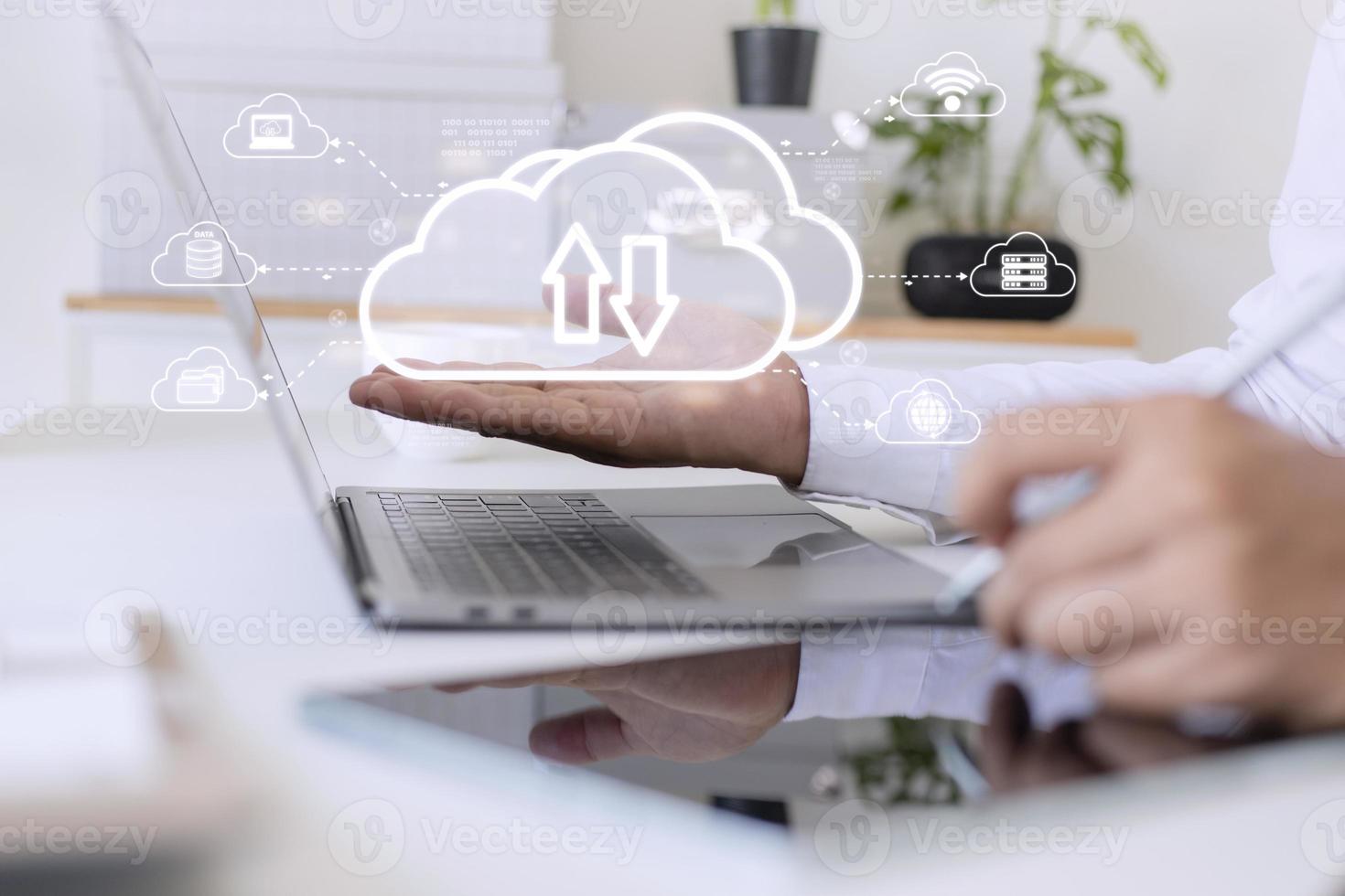 Man with cloud computing diagram show on hand. Cloud technology. Data storage. Networking and internet service concept. photo