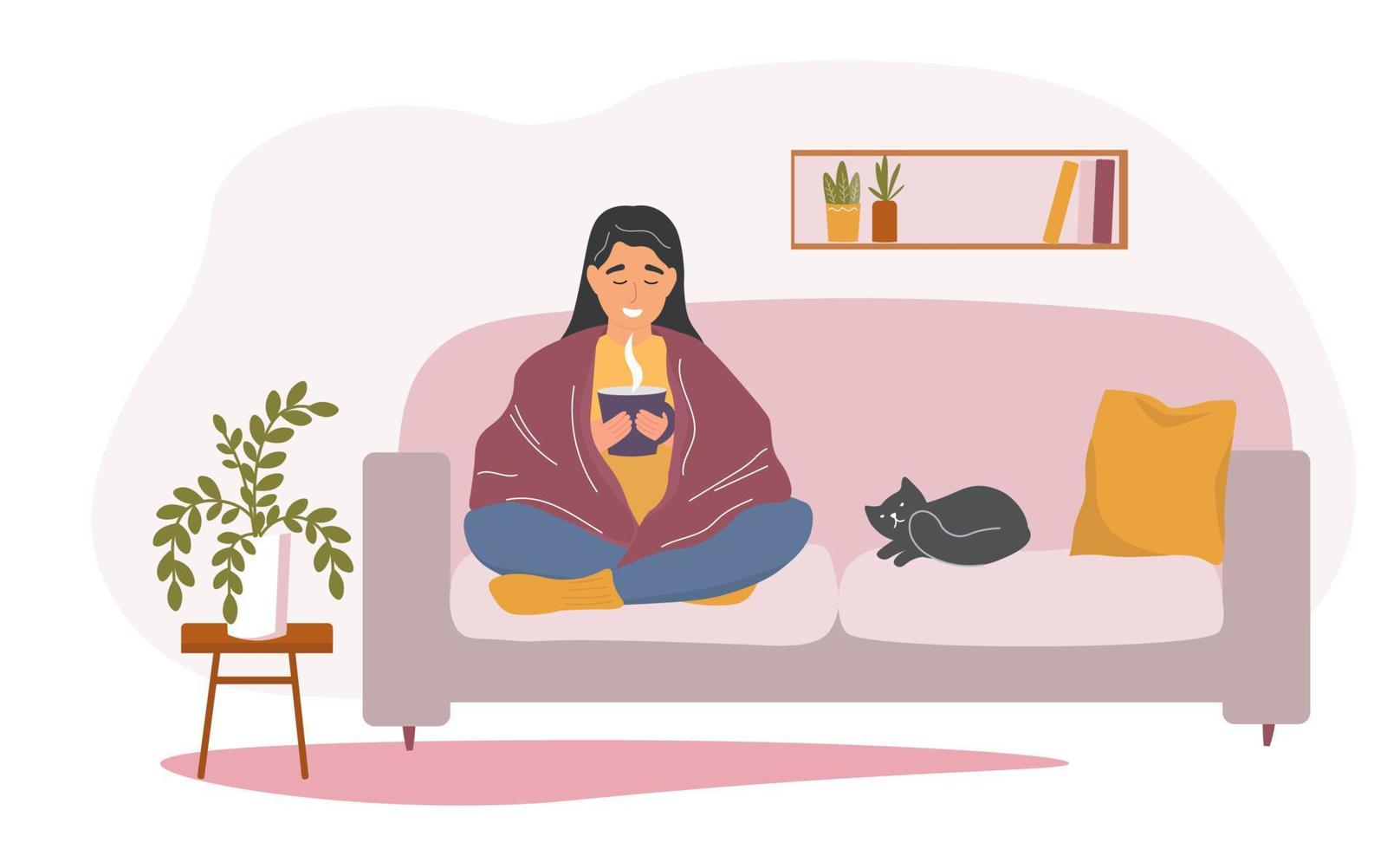 The girl is sitting on the sofa with a cup of hot drink under the blanket. A woman is warming herself under a blanket with a pet cat next to her. Vector graphics.