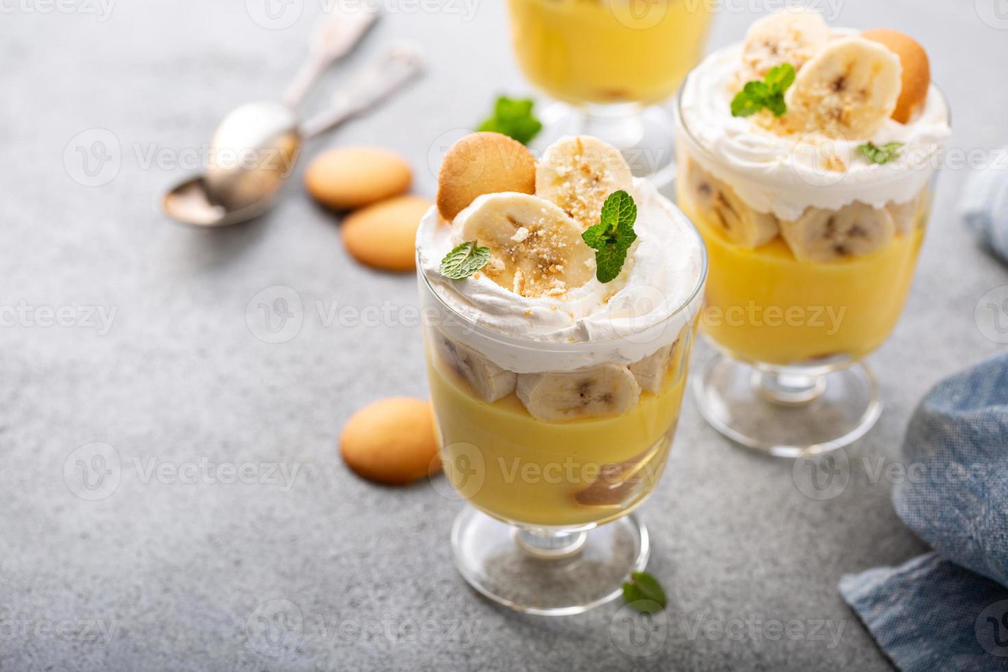 Banana pudding in small glasses photo