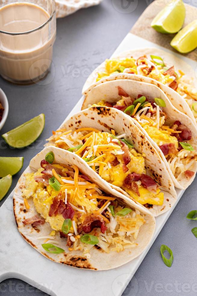 Breakfast tacos with hashbrowns, eggs and bacon photo