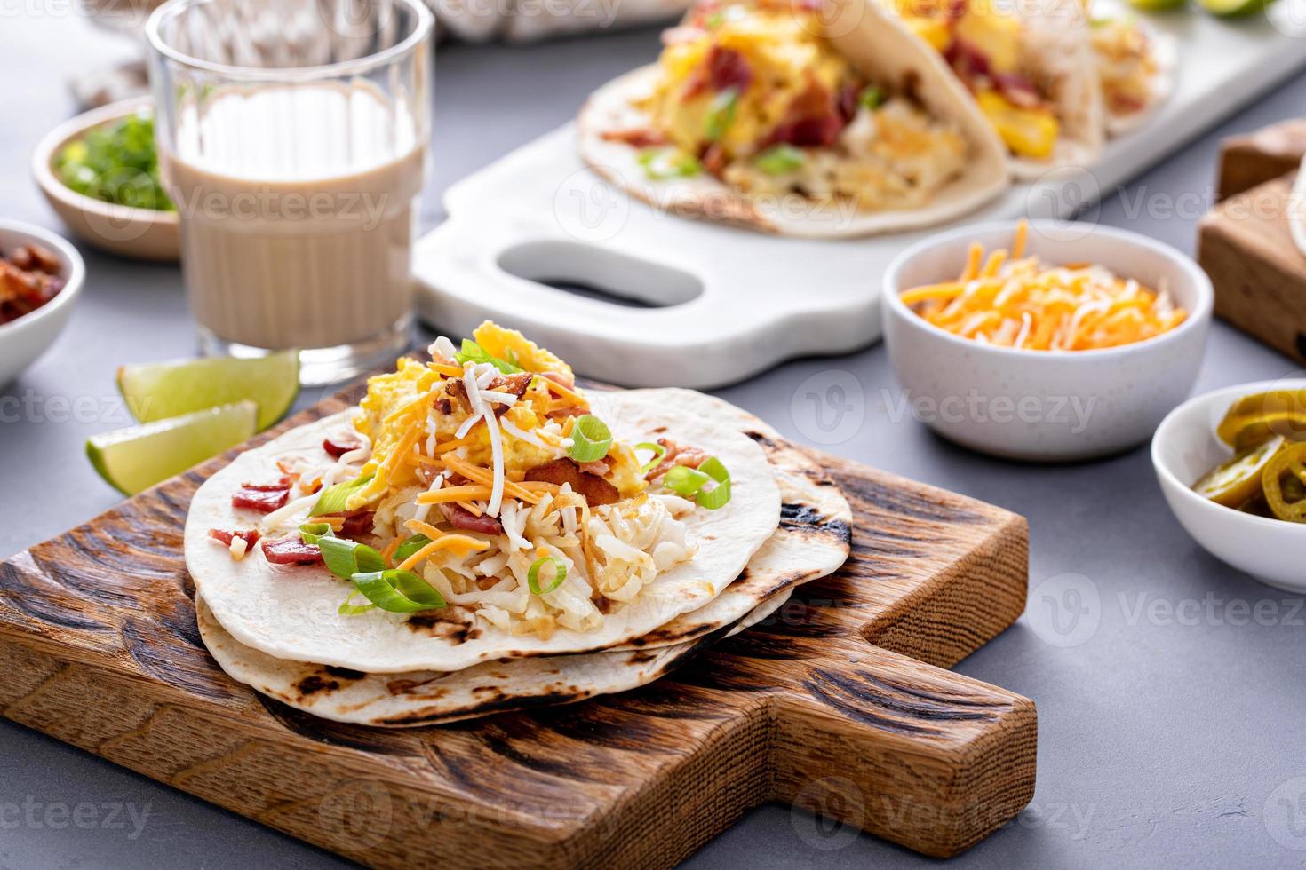 Breakfast tacos with hashbrowns, eggs and bacon photo