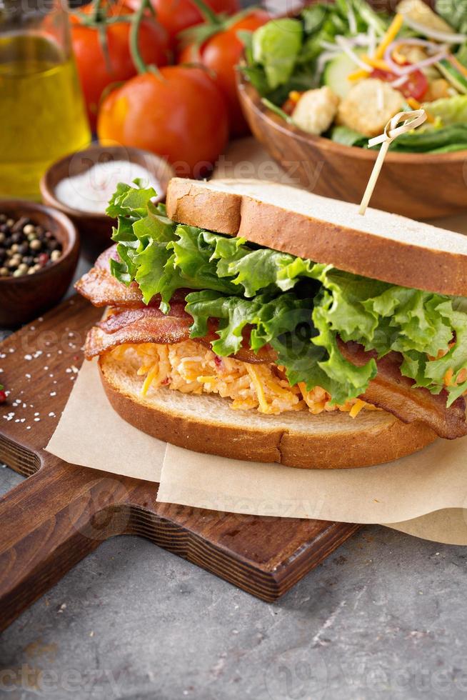 Pimento cheese, lettuce and bacon sandwich photo