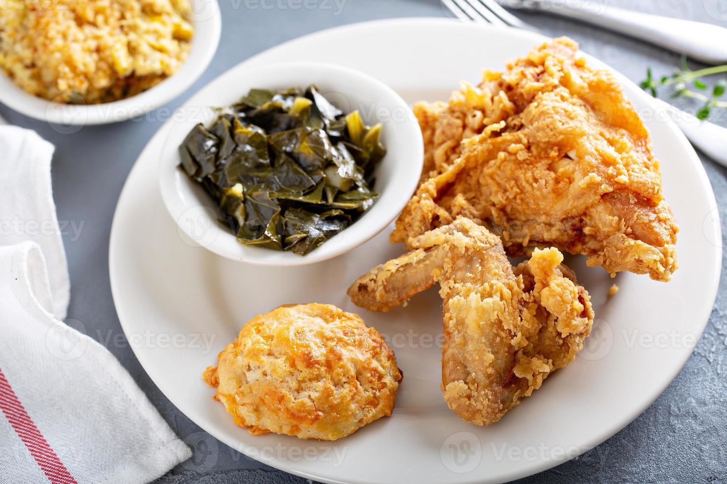 Southern fried chicken with collard greens photo