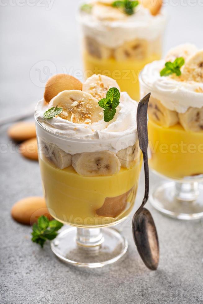 Banana pudding in small glasses photo