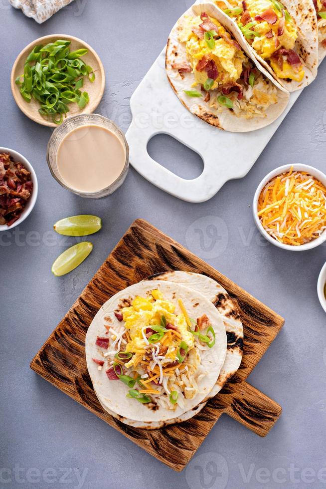 Breakfast tacos with hashbrowns, eggs and bacon photo