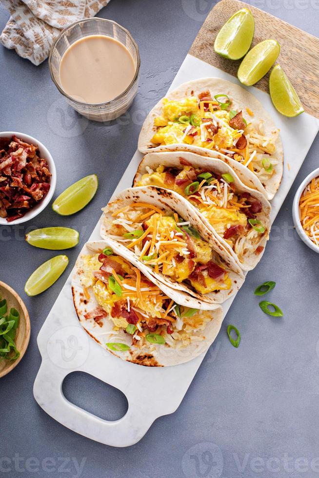 Breakfast tacos with hashbrowns, eggs and bacon photo