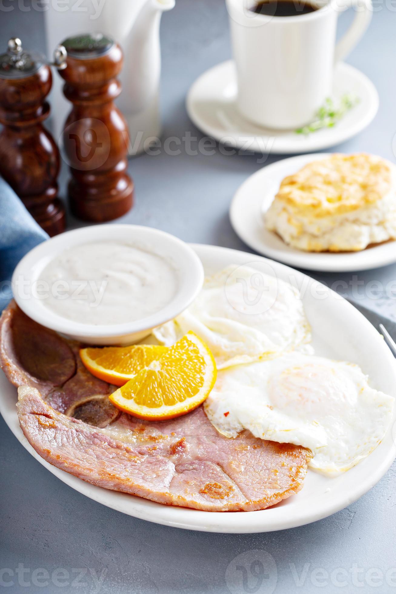 Ham and eggs breakfast with biscuits 15946211 Stock Photo at Vecteezy