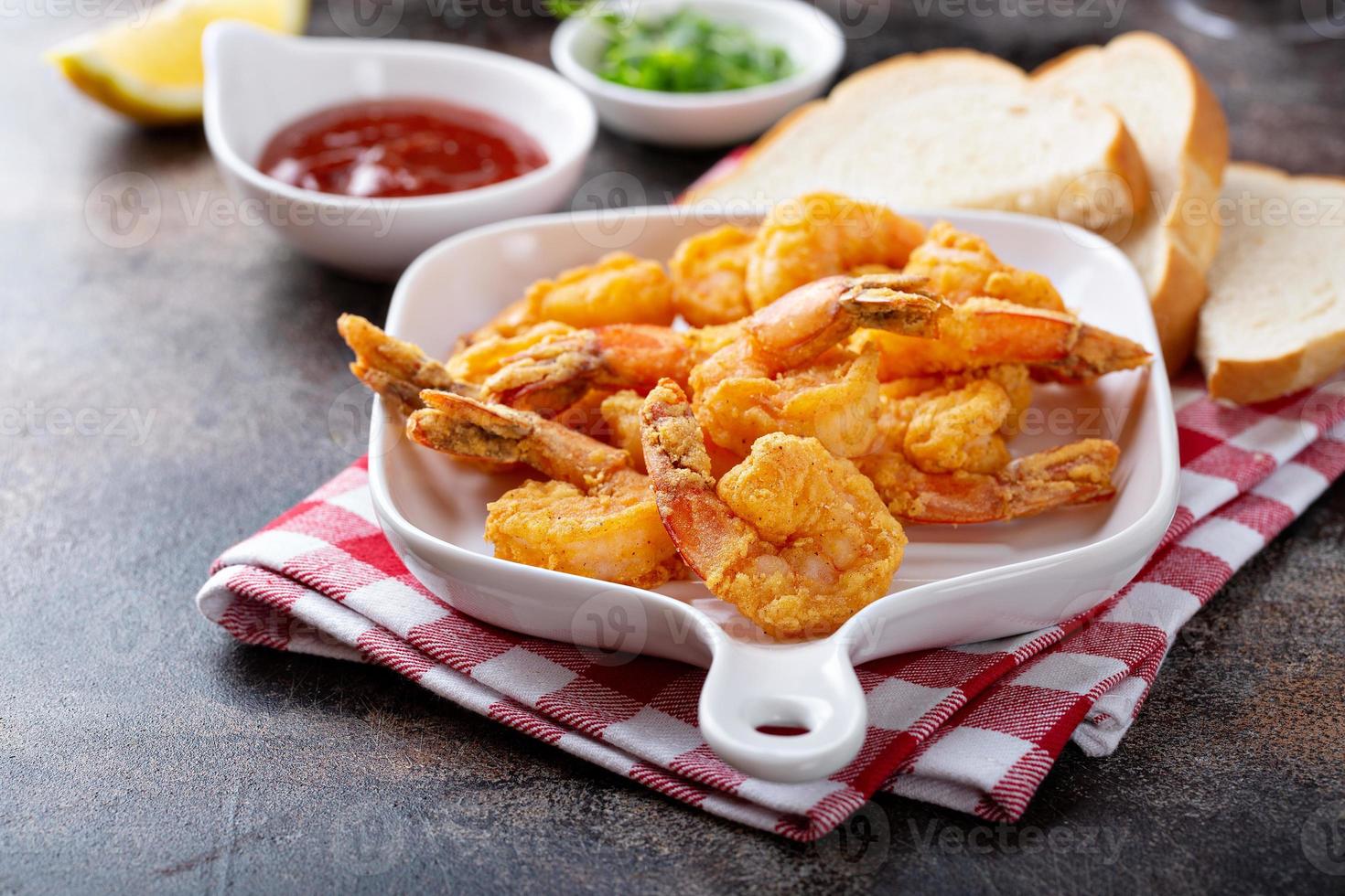 Southern fried shrimp with hot sauce photo