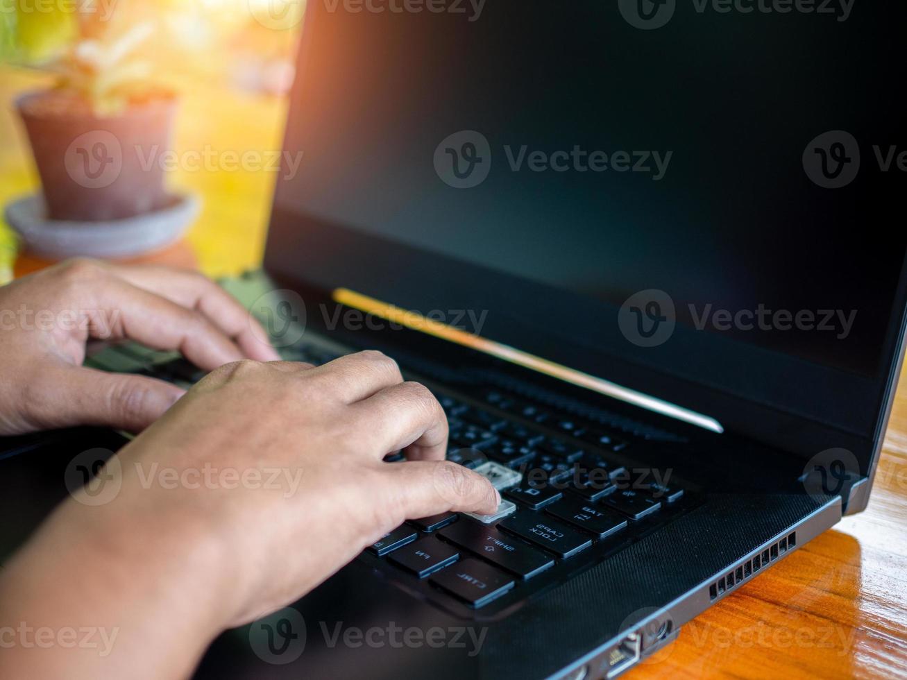 Human hand working on computer. business concept and communication technology photo