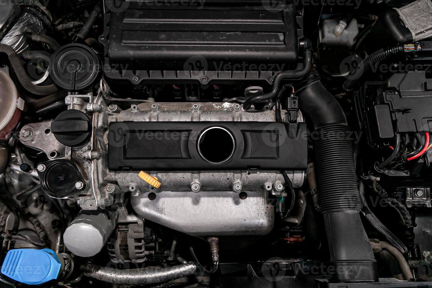 Close up detail of new car engine Car engine part. photo
