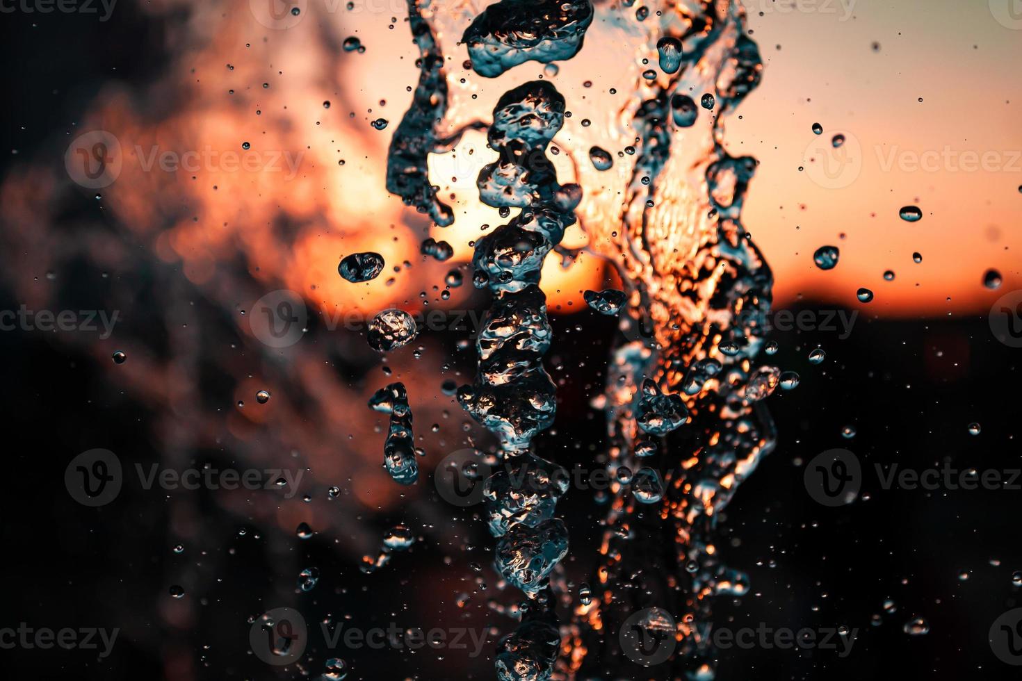Abstract water background. Texture of water waves of a large fountain photo