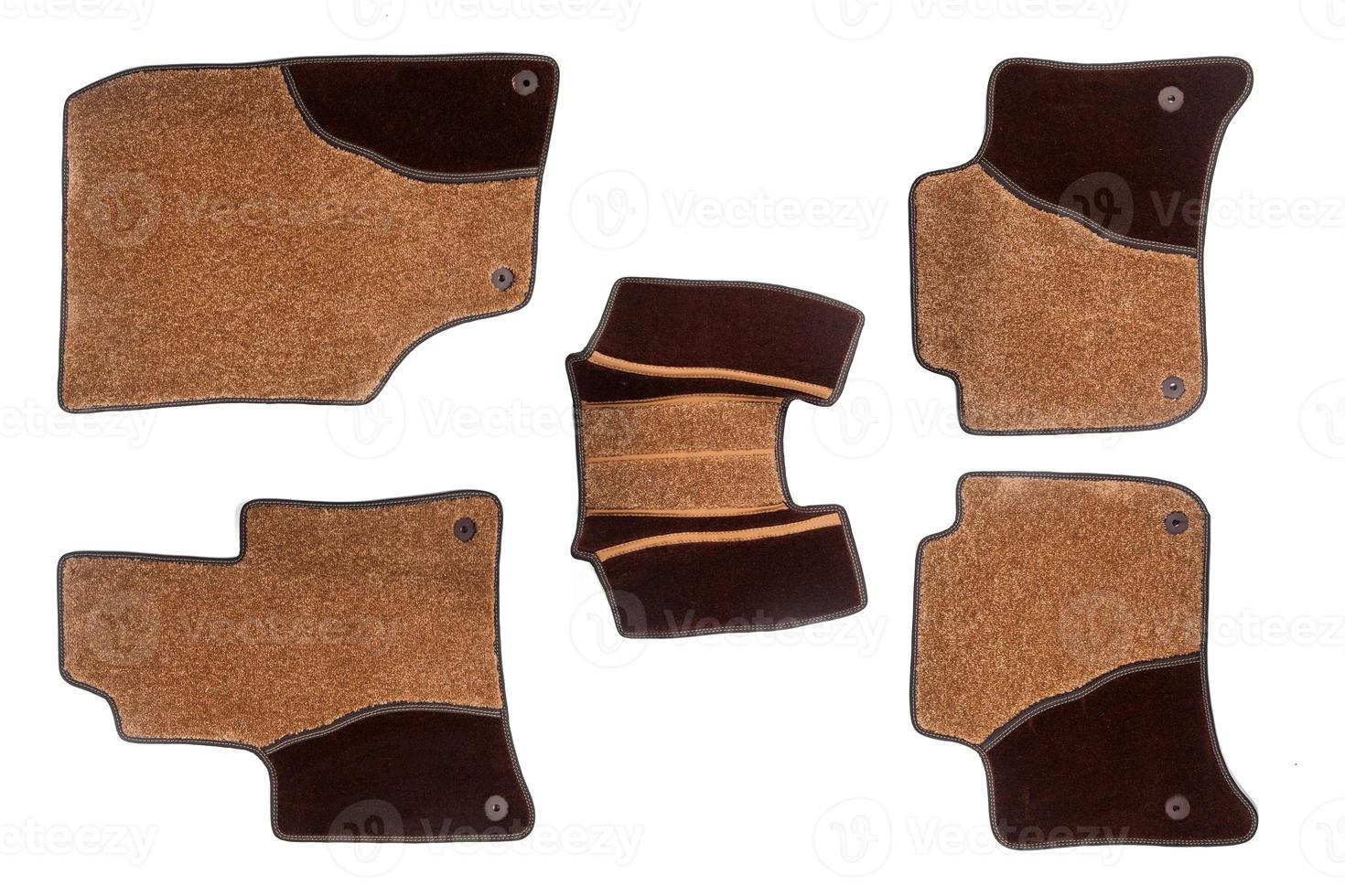 floor mats of carpet, velor for the front and rear seats of the car on a white isolated background, top view. photo