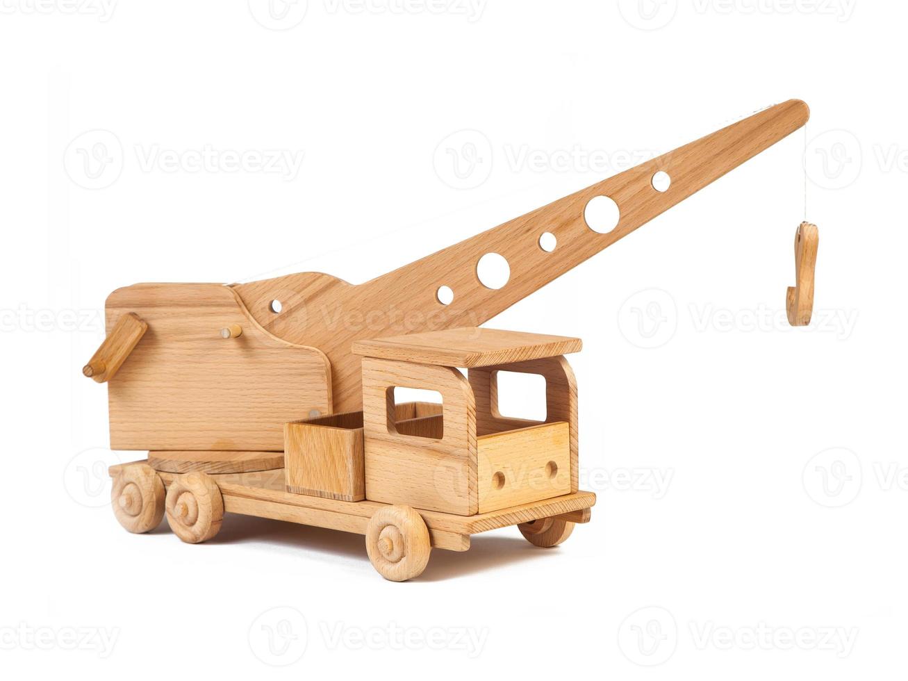 Photo of a wooden crane truck made of beech on a white isolated background