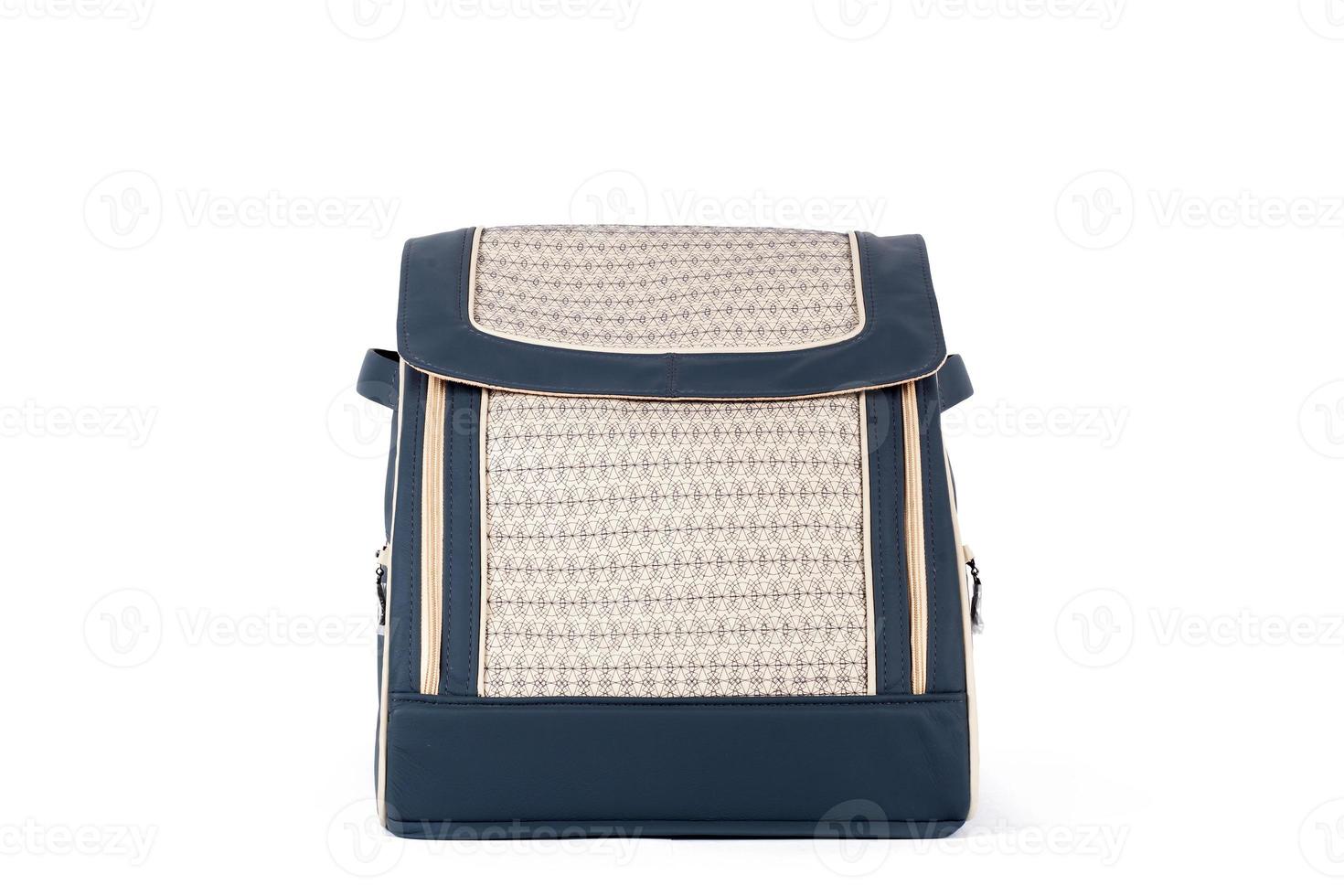 leather bag for storing things and traveling on a white isolated background. Luggage, handmade suitcase photo