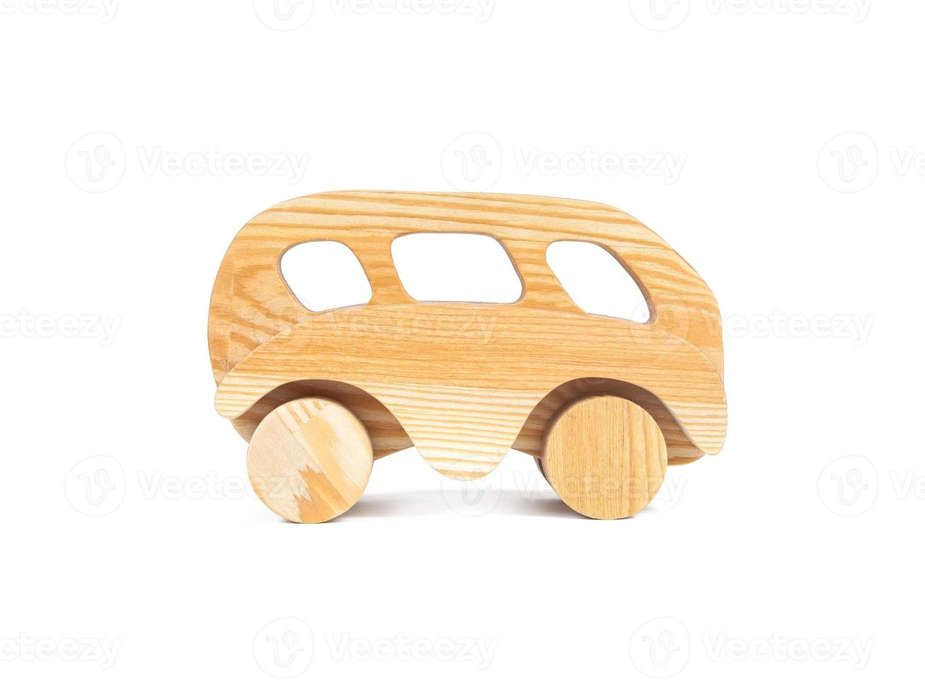 Photo of a wooden bus made of beech on a white isolated background
