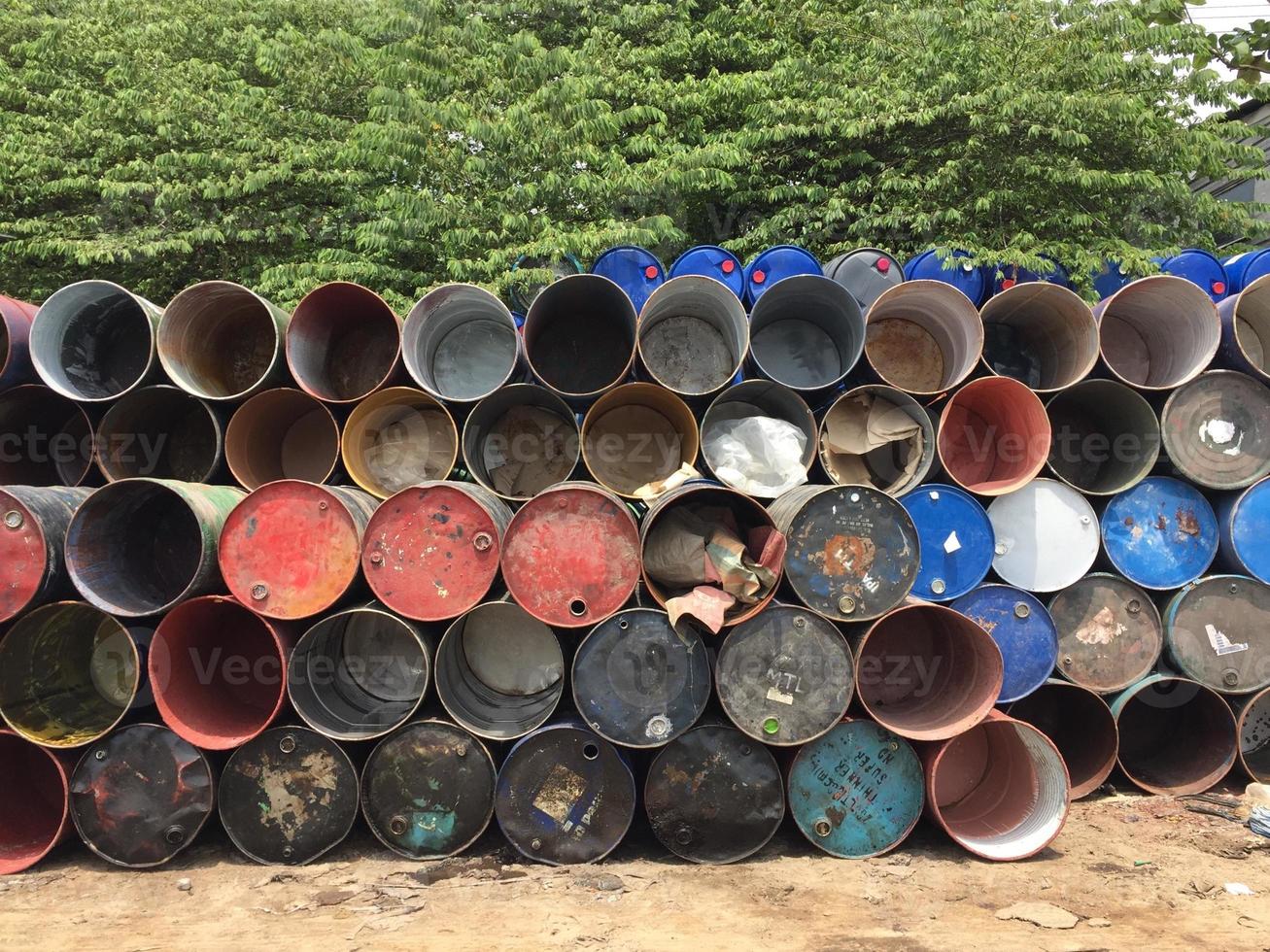 Used oil drums that are not used and arranged neatly in 3 - 5 layers. no people. photo
