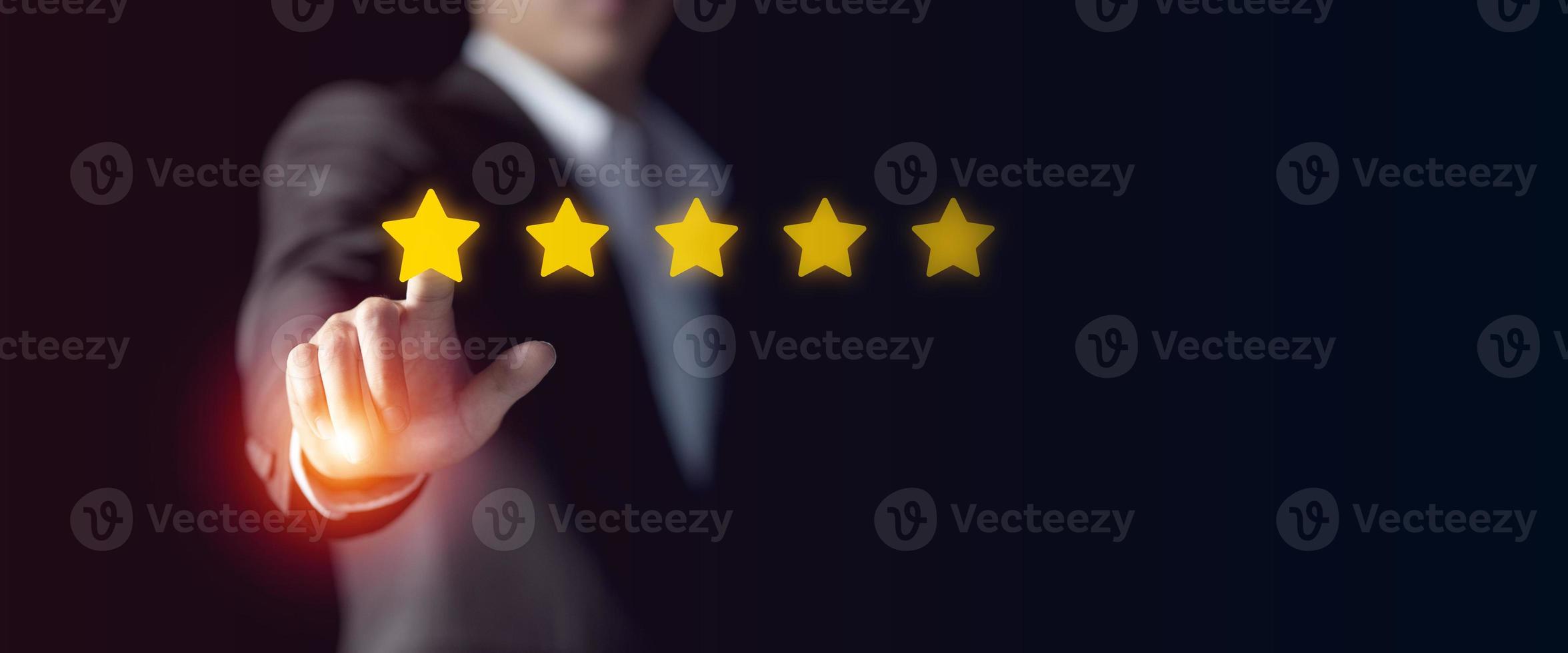 Businessman give rating to service experience, User Experience concept, Customer review satisfaction feedback survey, Customer giving a Five Star to business ranking photo