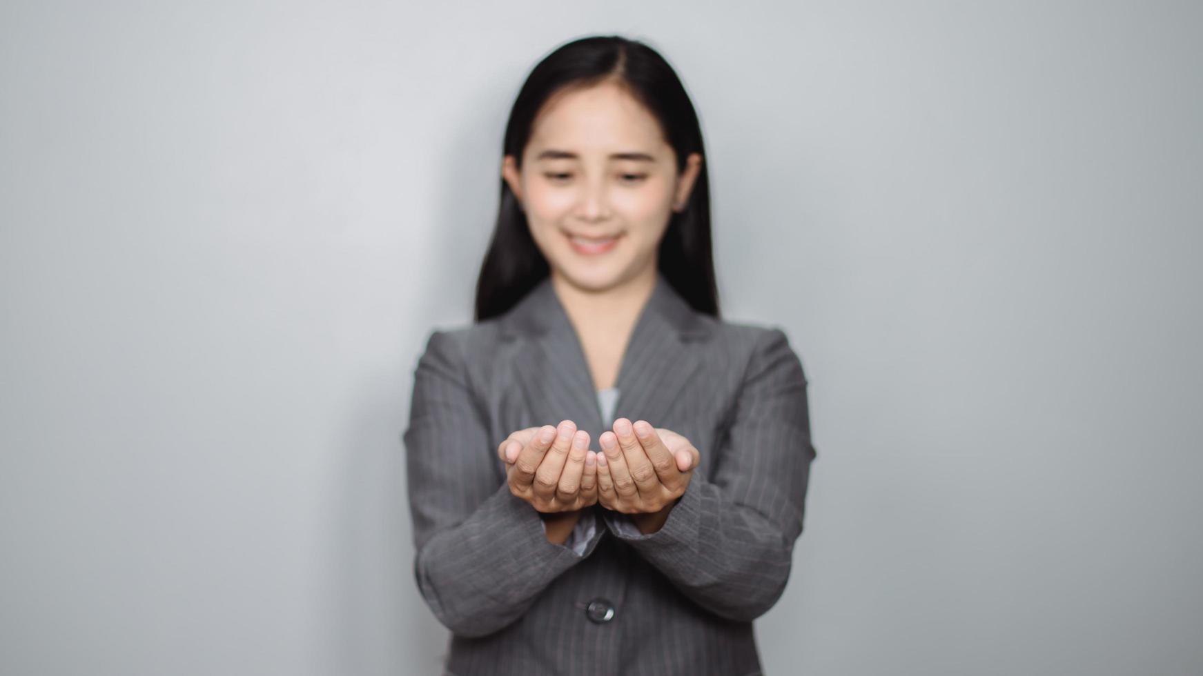 woman doing hand holding something photo