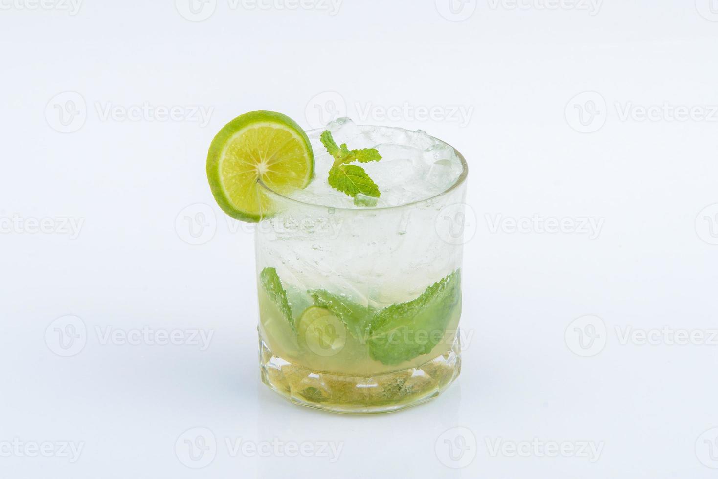 Lemon soda. Beverage for summer with brick wall background. photo