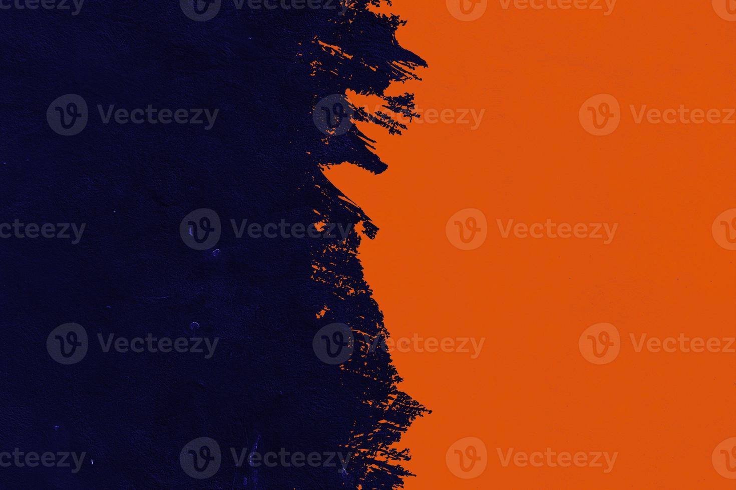 Dark blue and orange background texture brush. Abstract brush background, on a concrete wall photo